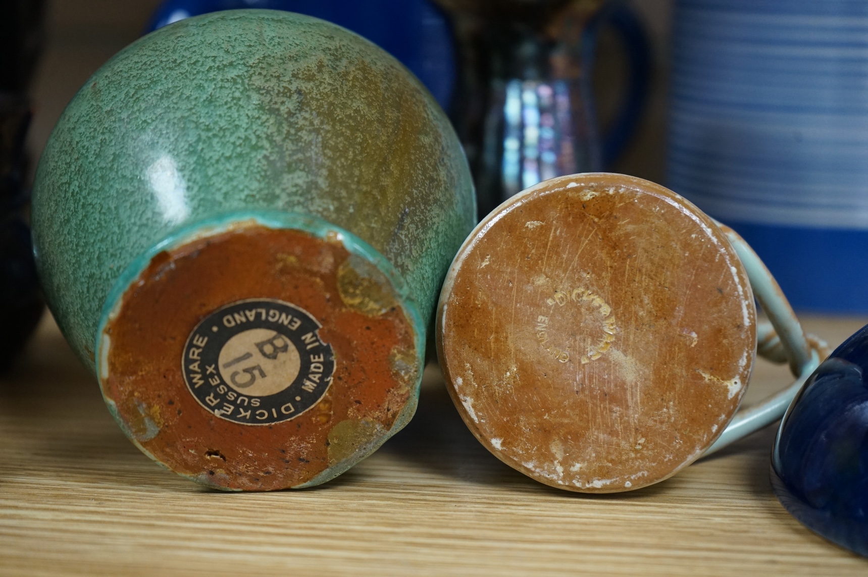 A collection of pottery to include lustre glazed jugs and tygs, a T. G. Green storage jar, Carltonware ash tray and a miniature Ruskin style vase, largest 18cm high